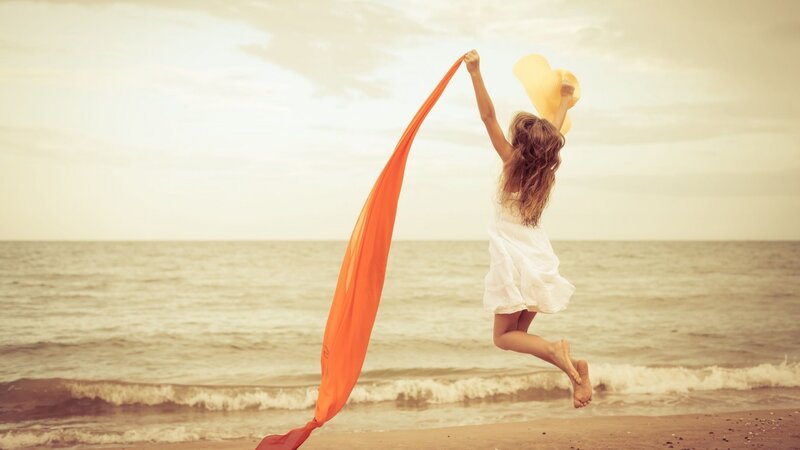 Woman Jumping on Beach — Orange