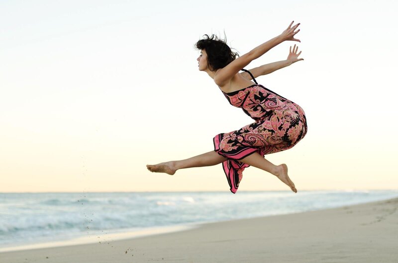 Woman Jumping on Beach — Pink