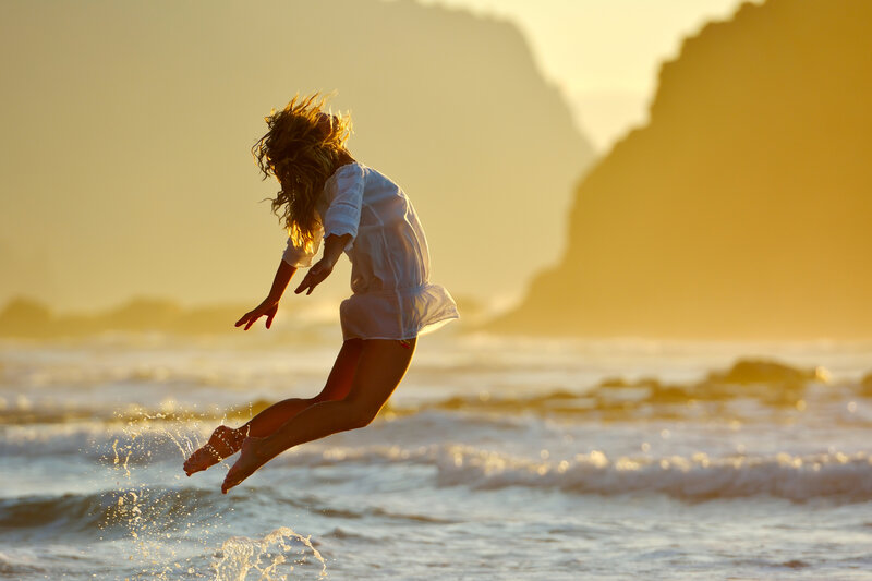 Woman Jumping on Beach — Yellow