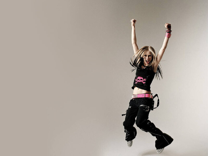 woman jumping with fists raised
