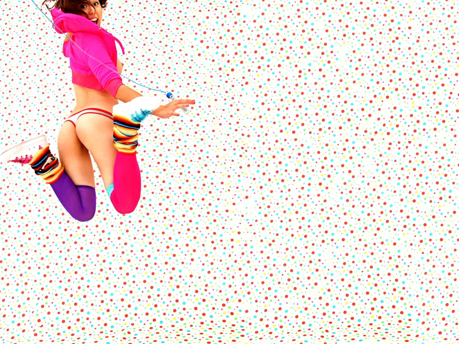 woman jumping with jump rope