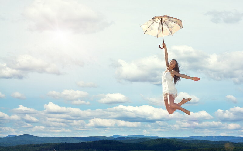 Woman Jumping with Umbrella — Blue