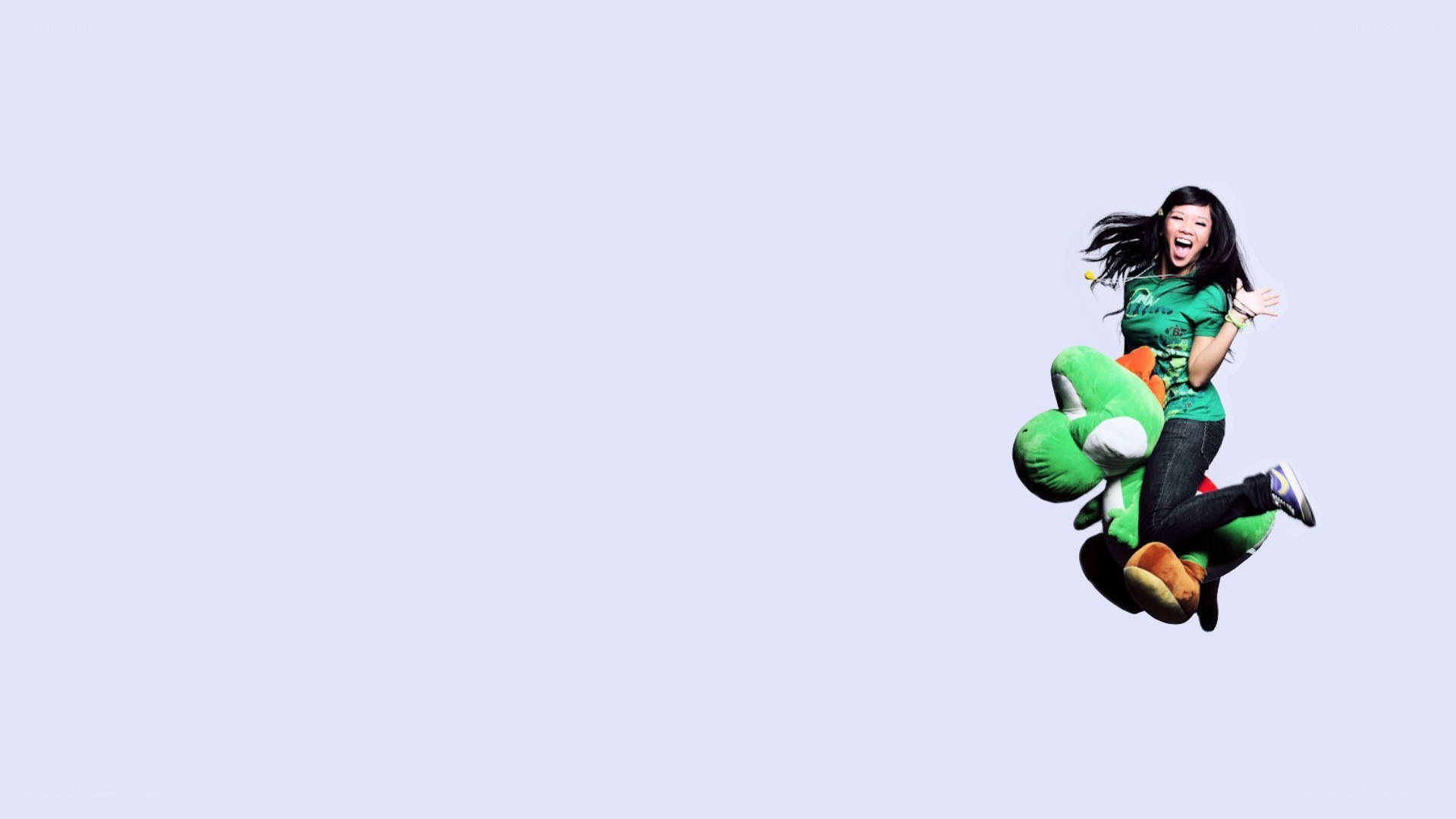 woman jumping with yoshi plush