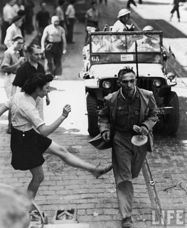 Woman kicks soldier in street