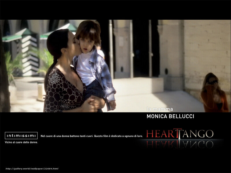 woman kissing child on cheek