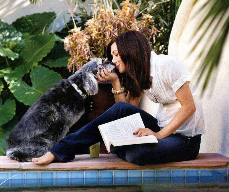 Woman Kissing Dog