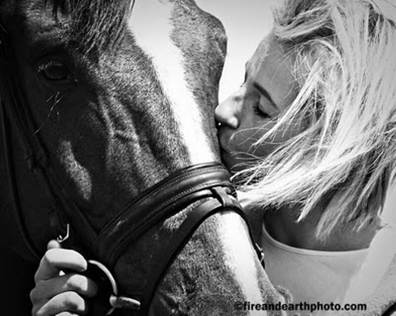 Woman Kissing Horse