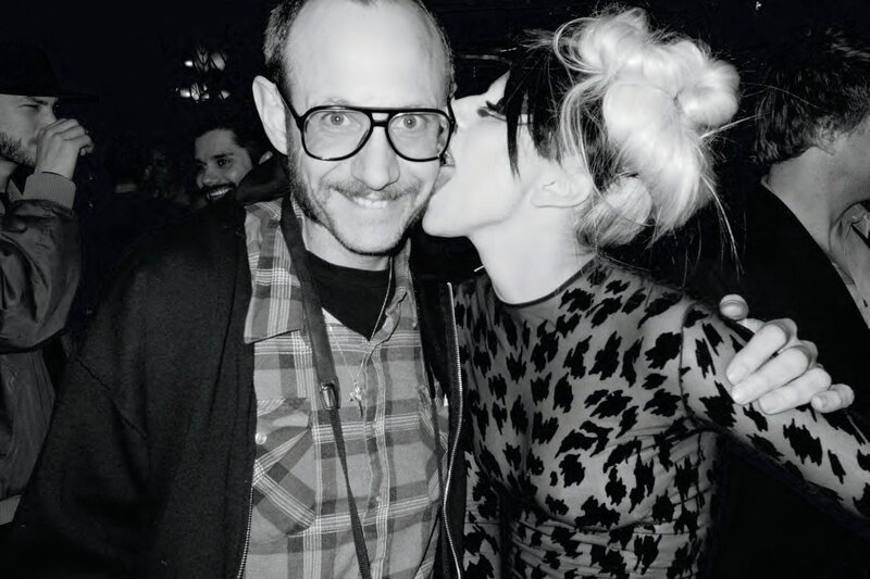 woman kissing man on cheek