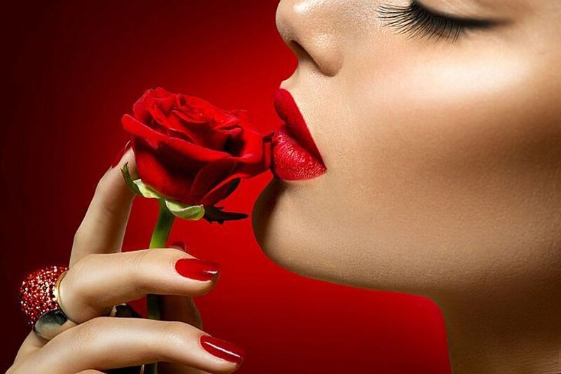 Woman Kissing Rose