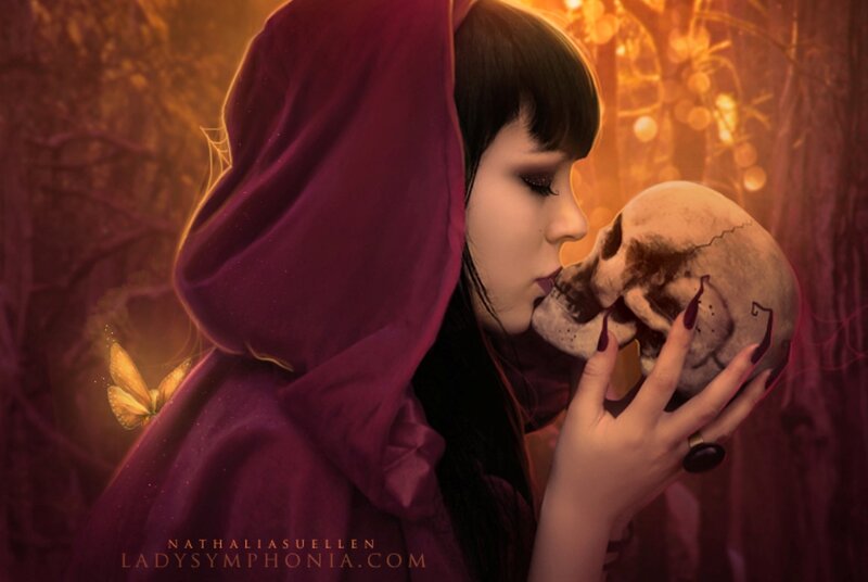 Woman Kissing Skull