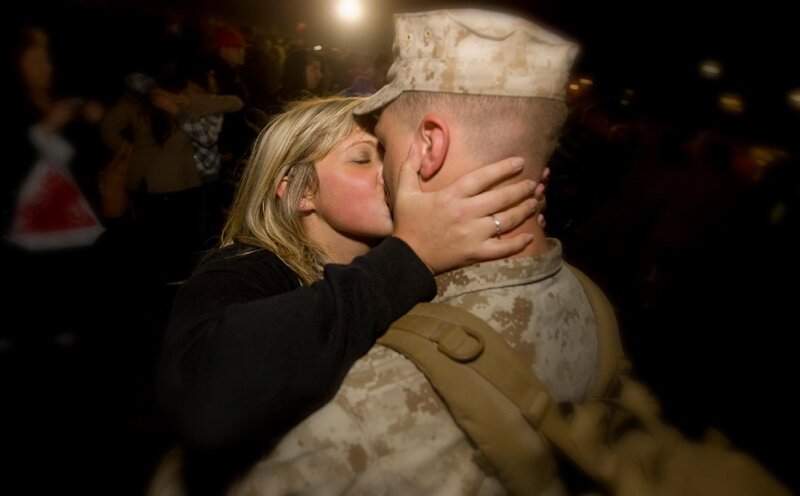 Woman Kissing Soldier