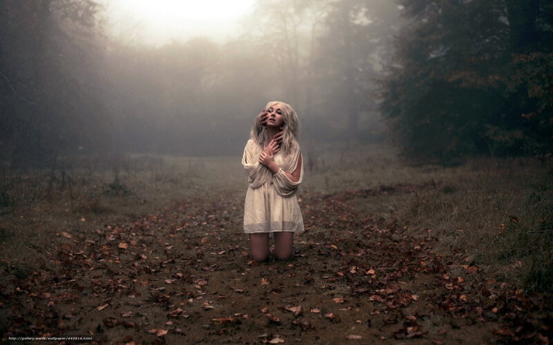 Woman Kneeling in Fog