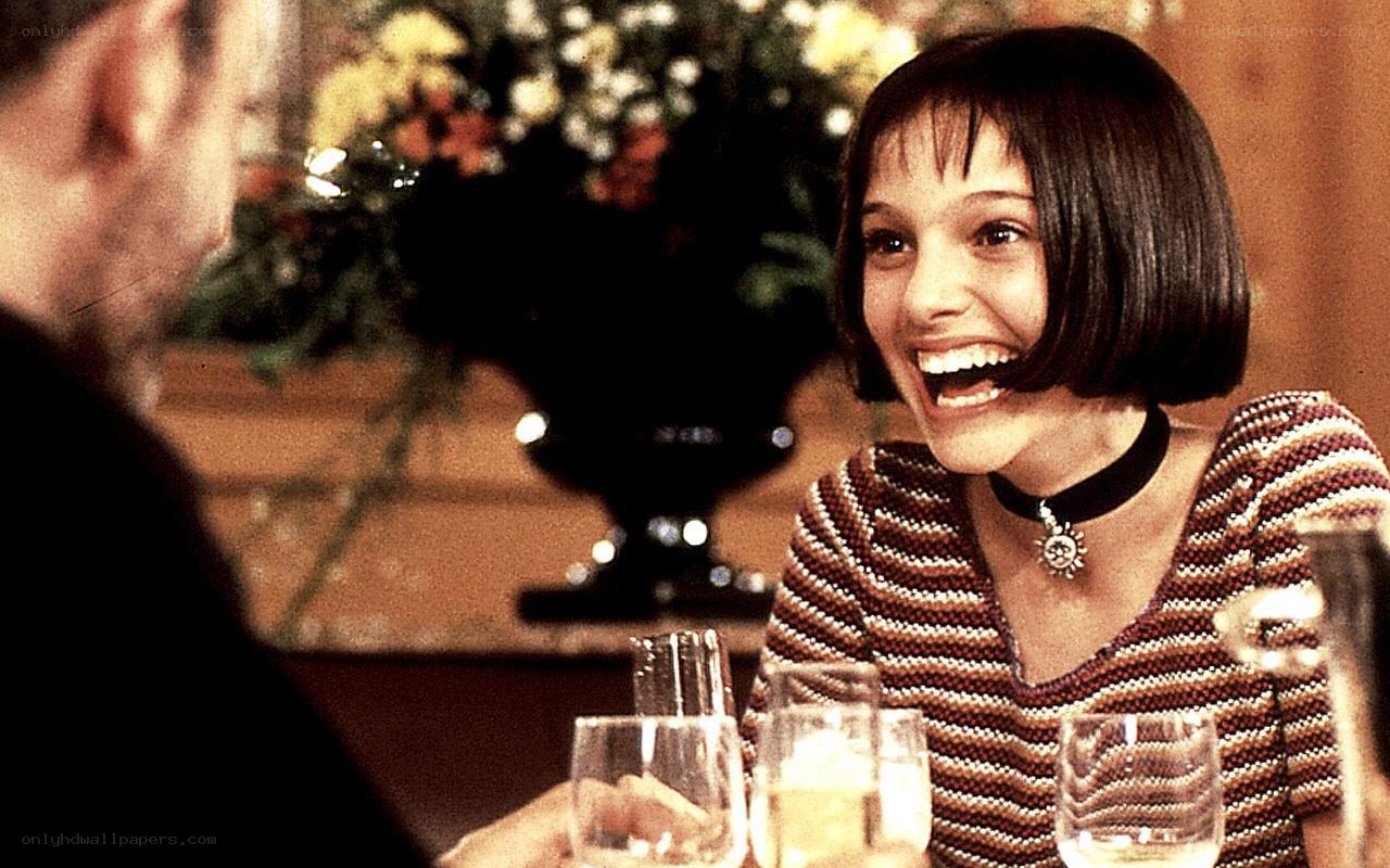 woman laughing at dinner