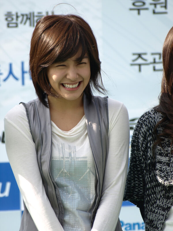 woman laughing at event