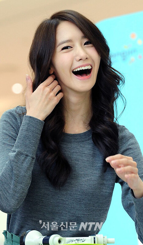 woman laughing at event
