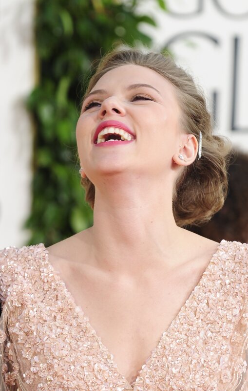 woman laughing at event