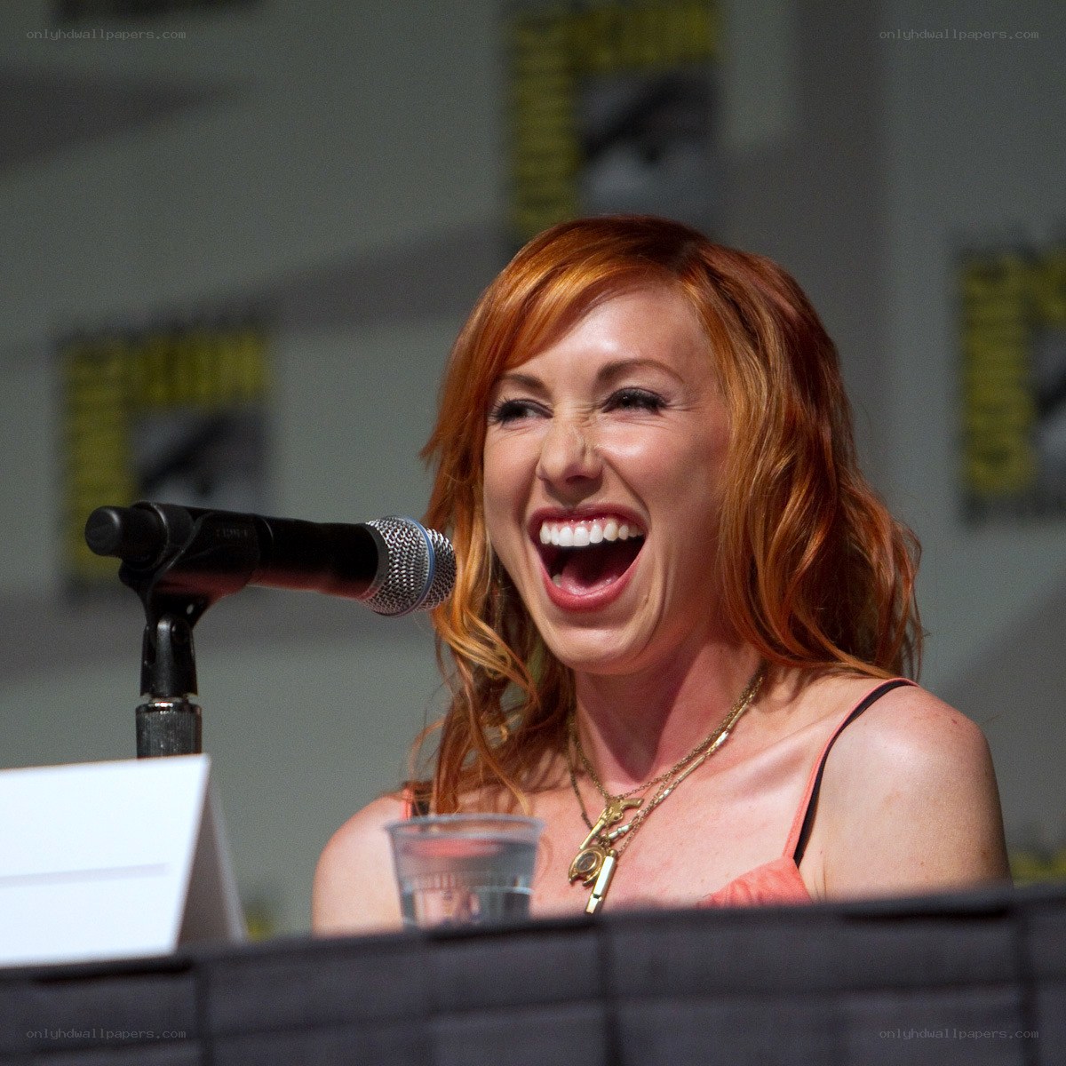 woman laughing at panel