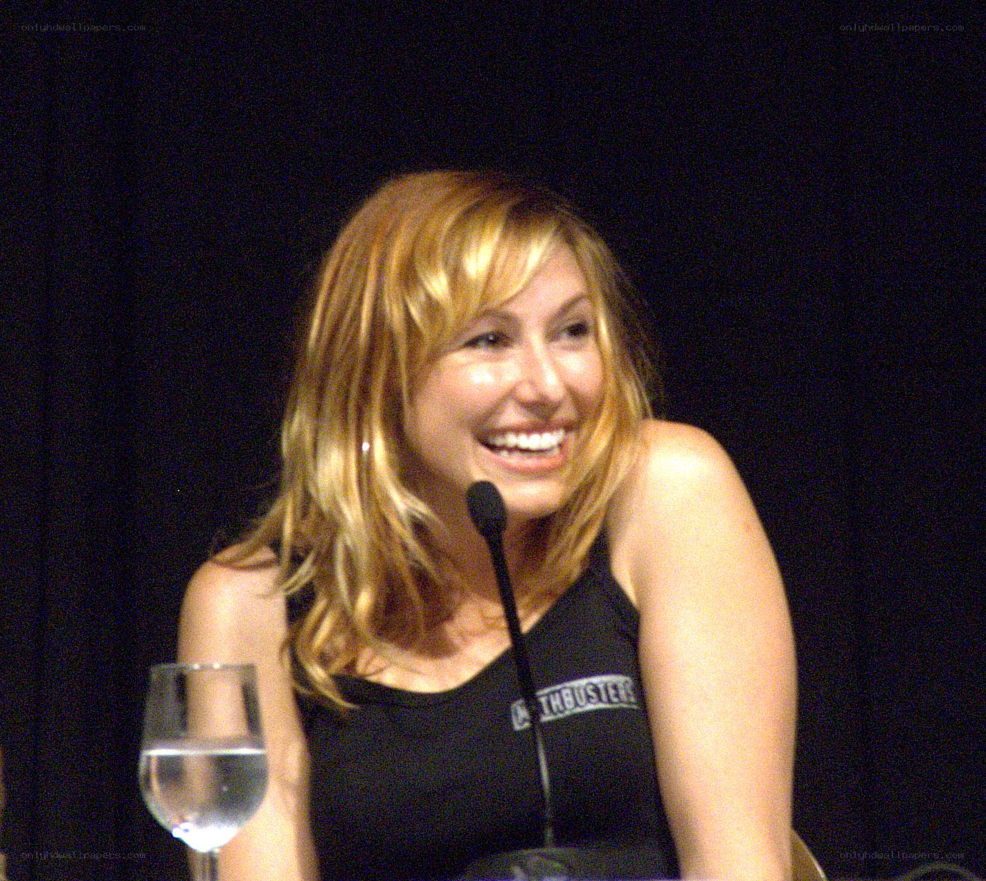 woman laughing at panel