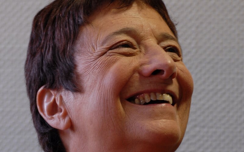 woman laughing happily