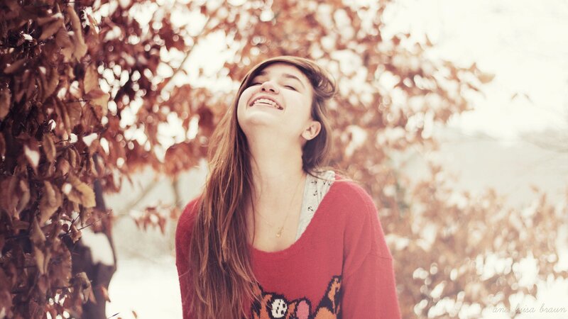 woman laughing in autumn
