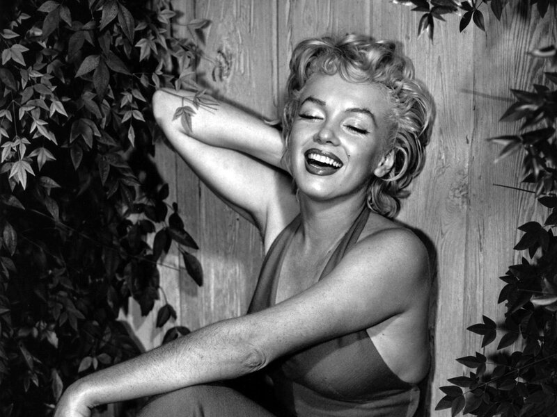 Woman Laughing in Garden — Black