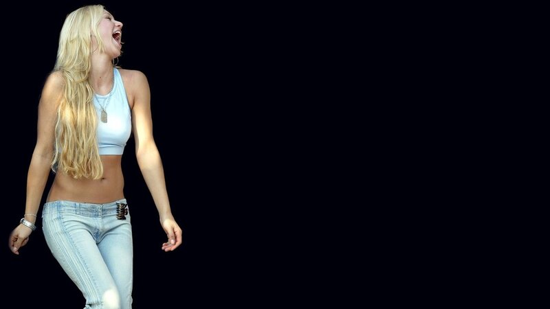 Woman Laughing in Jeans