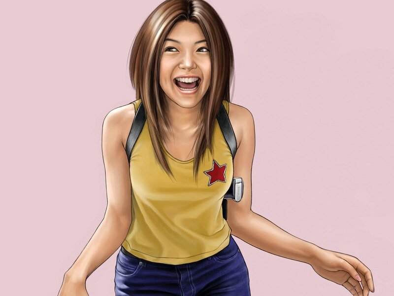 woman laughing in yellow top