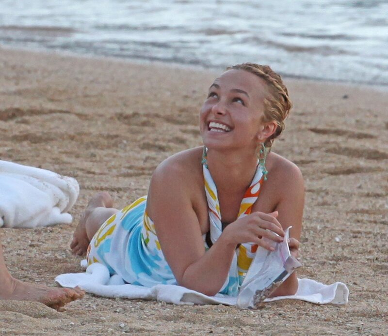 Woman laughing on beach
