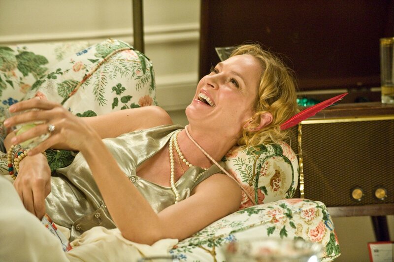 Woman Laughing on Couch — Gold