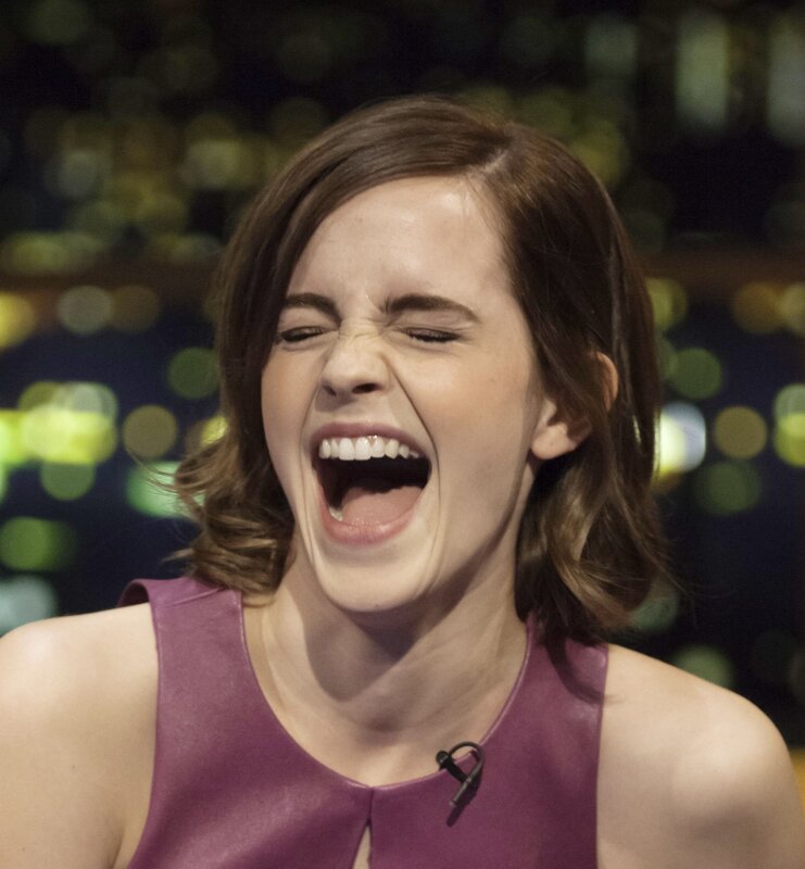 woman laughing on talk show