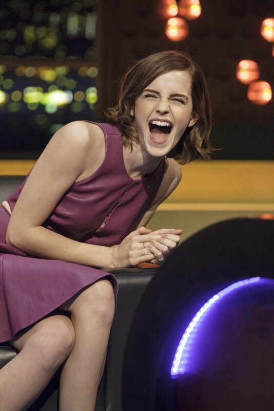 woman laughing on talk show