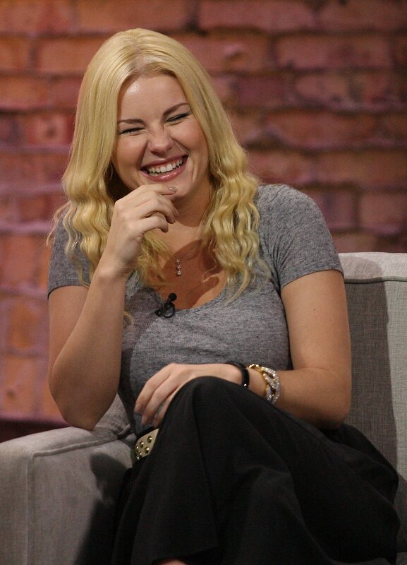 woman laughing on talk show