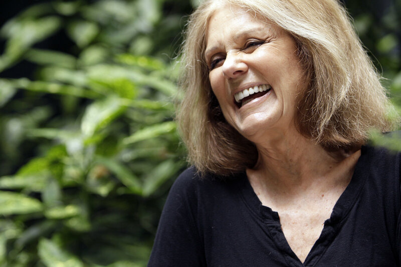 woman laughing outdoors