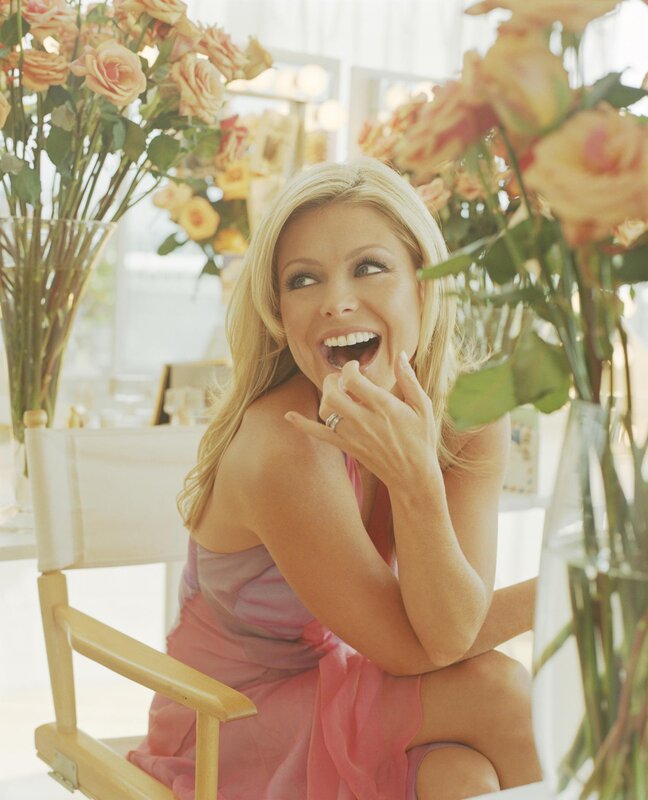 woman laughing with flowers