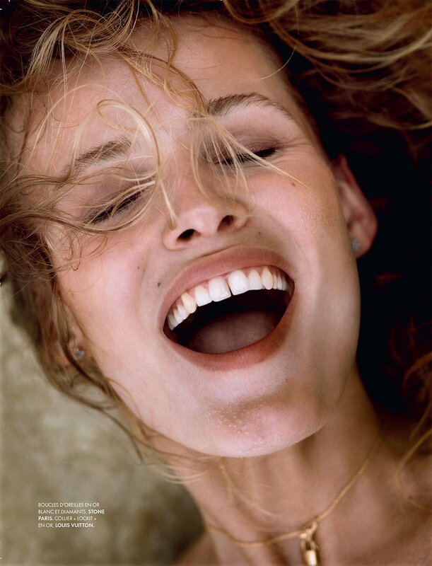 woman laughing with hair in face