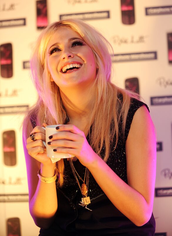 woman laughing with mug