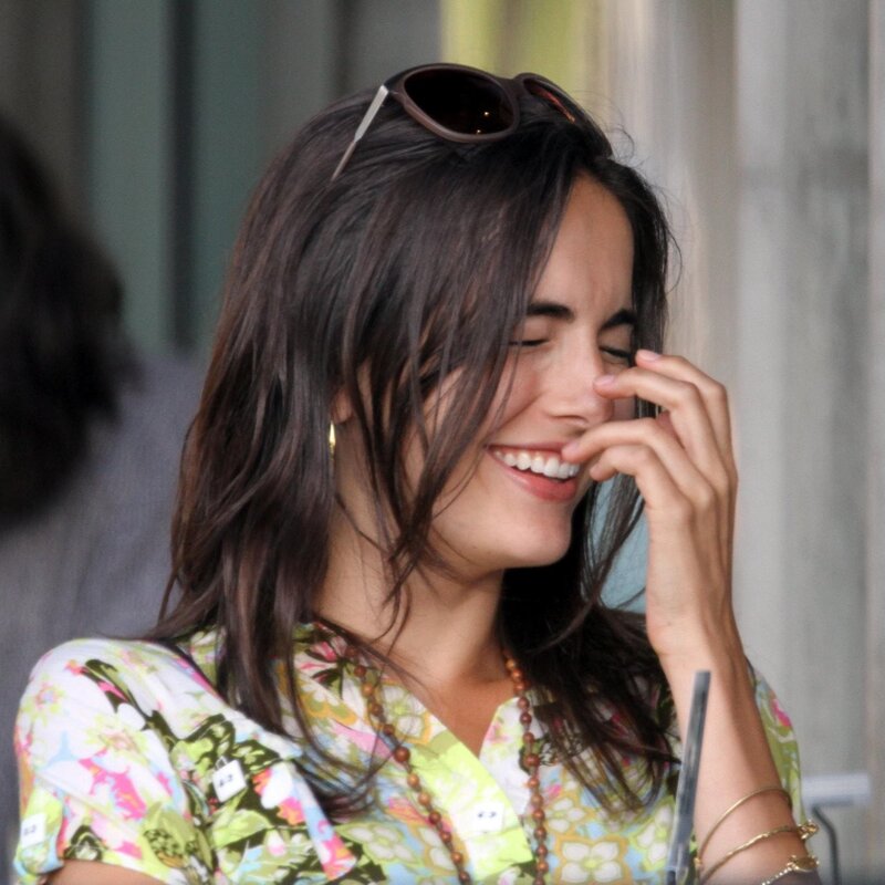 woman laughing with sunglasses