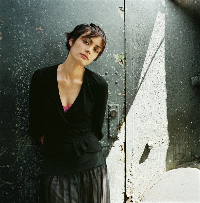 woman leaning against a door