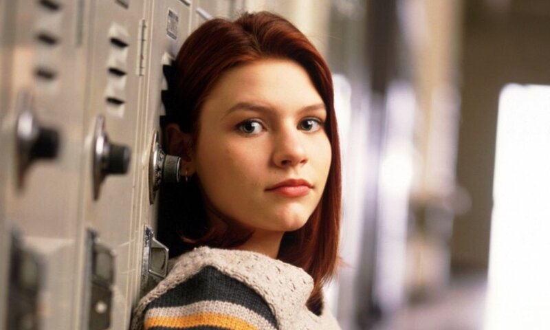 woman leaning against lockers
