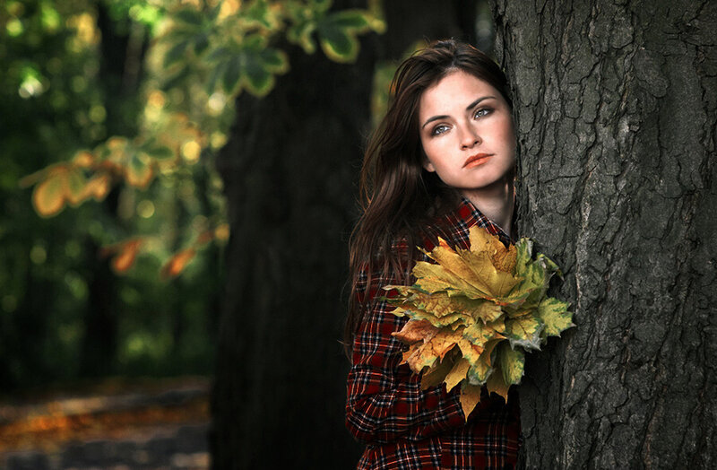 Woman Leaning Against Tree — Brown