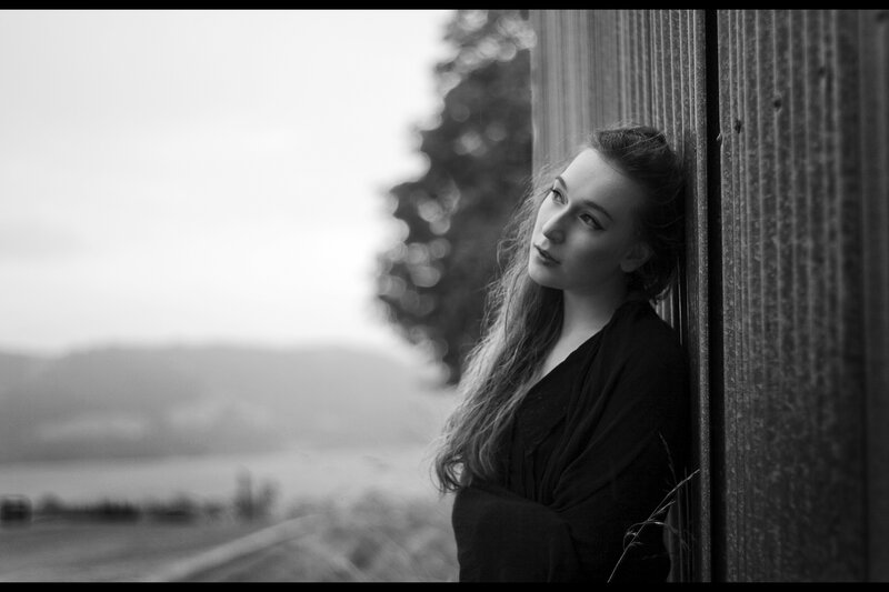 woman leaning against wall