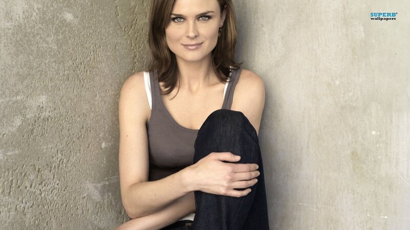 woman leaning against wall