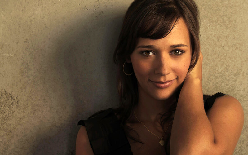 woman leaning against wall