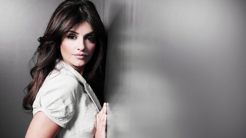 woman leaning against wall