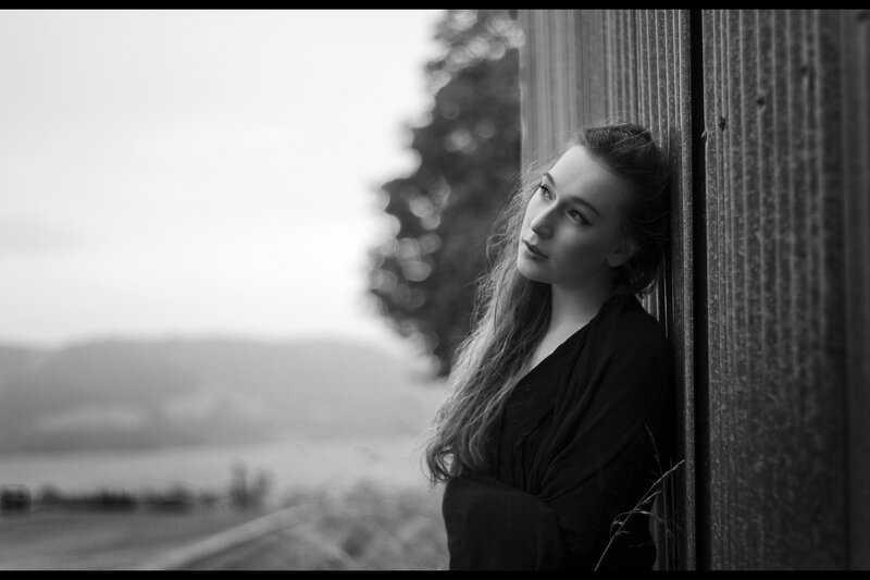 woman leaning against wall