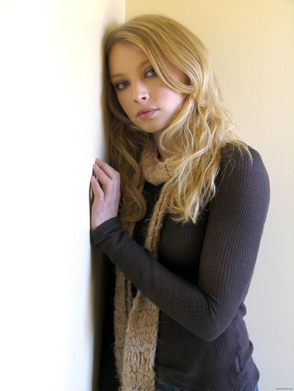 woman leaning against wall