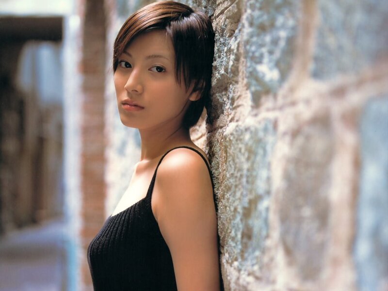 Woman Leaning Against Wall — Black, Calm