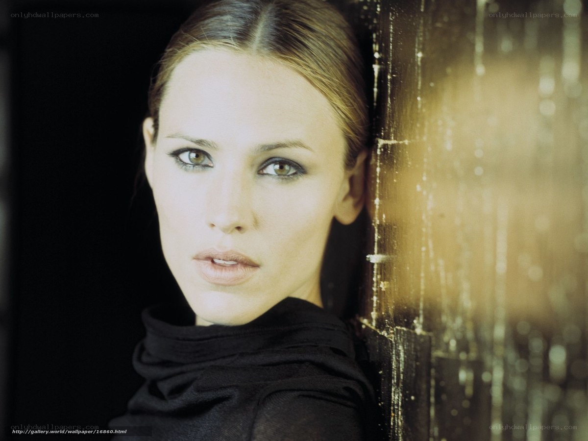 woman leaning against wall