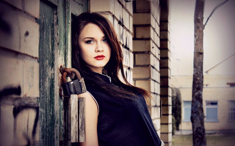 woman leaning on a door