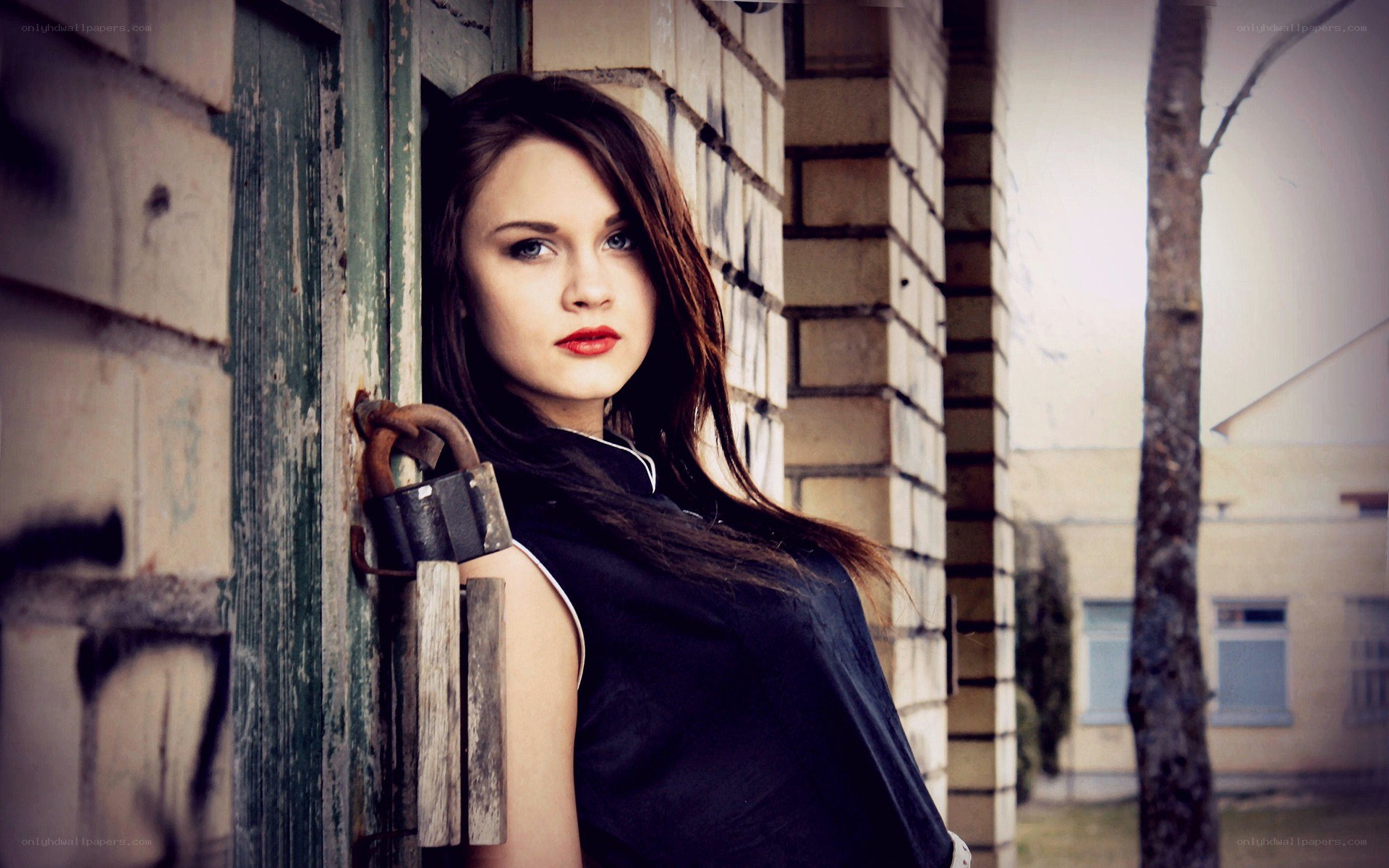 woman leaning on a door
